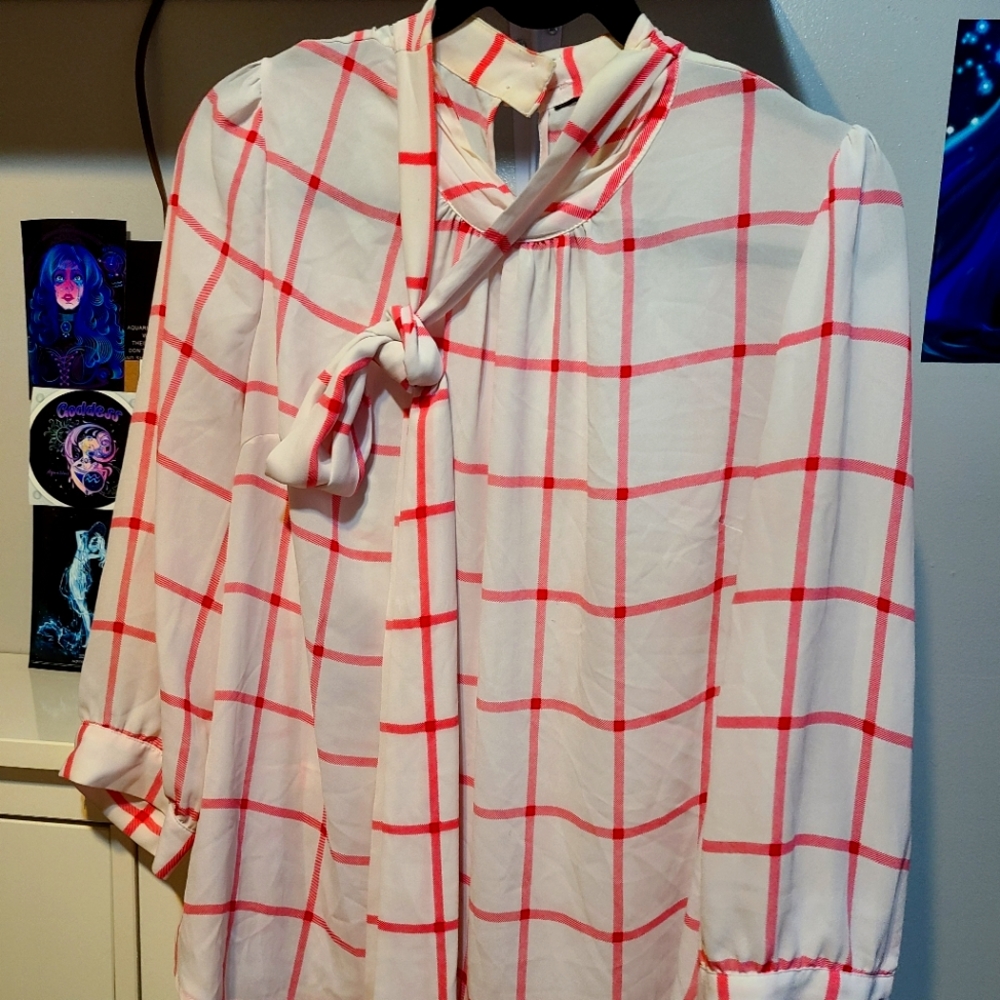 Striped blouse with tie in the front.